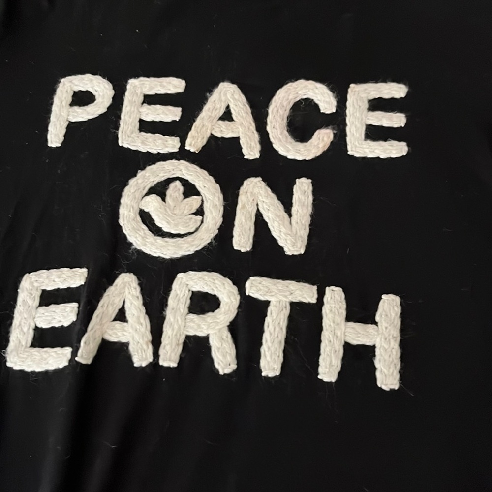 Embroidered peace on earth in white on black shirt size large not super large